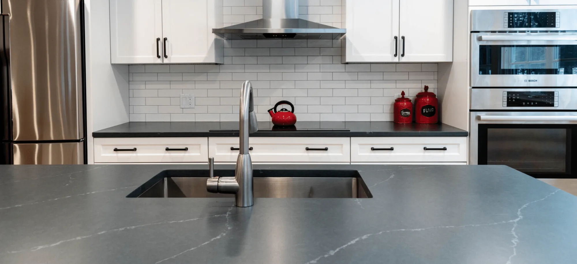 Charcoal Soapstone Kitchen Countertops and Island with White Subway Tile Backsplash Natural Stone Countertops