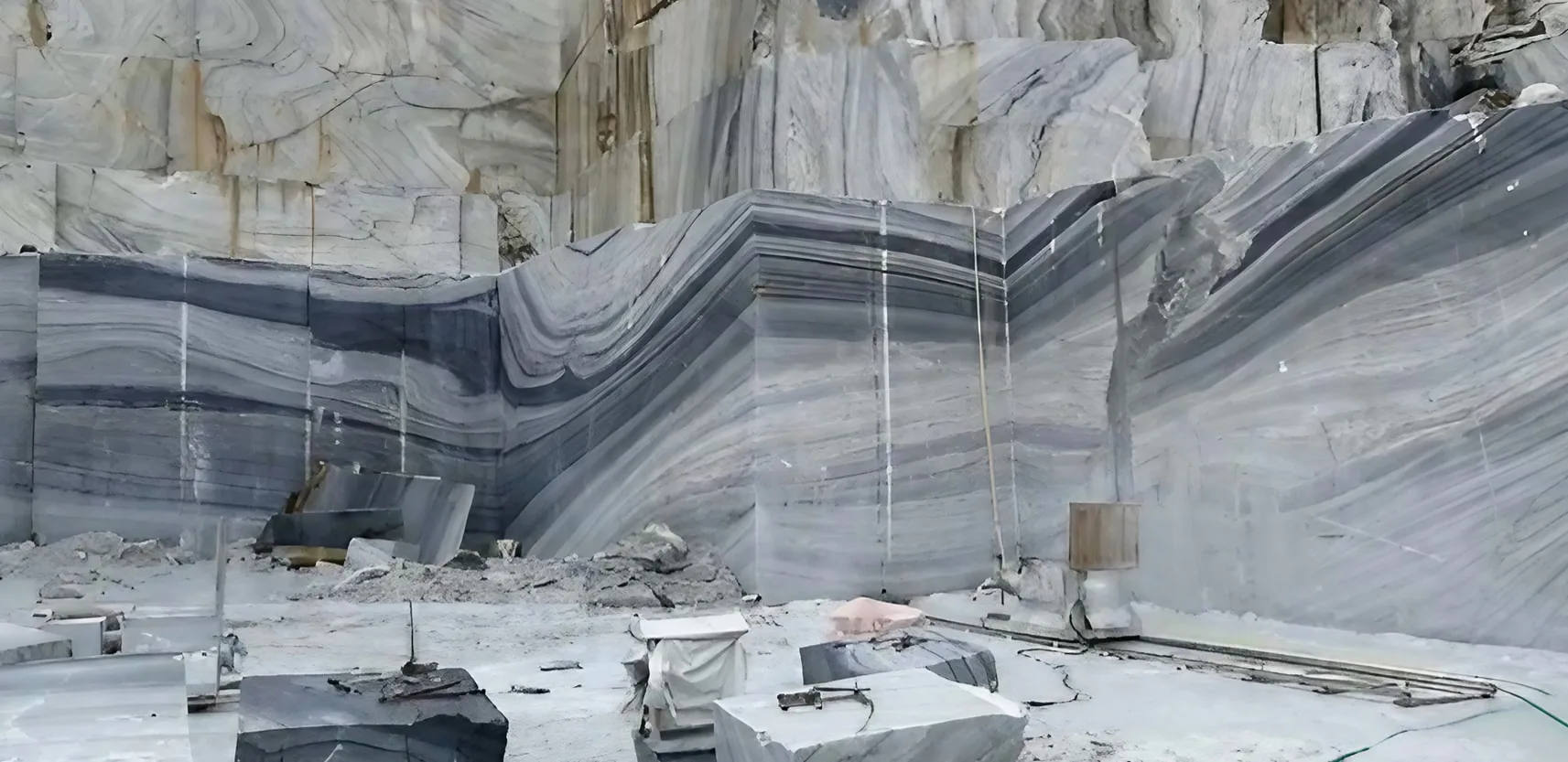 The Blue Danube Marble Quarry, situated in Jiangsu China, is renowned for its exquisite Blue Danube Marble. This marble boasts a captivating blue-gray color with distinct veining, reminiscent of flowing water. The quarry's blend of ancient techniques and modern precision allows skilled artisans to extract and transform the marble into elegant slabs that showcase its natural beauty. Blue Danube Marble finds application in diverse areas, from architecture to interior design, adding depth and sophistication. A visit to the quarry offers a chance to witness the harmony of nature and human creativity, as each marble slab embodies the surroundings and craftsmanship. The quarry stands as a testament to the enduring connection between Earth's treasures and artistic innovation, capturing the allure of blue-gray hues and the artistry that shapes them into enduring works of elegance.