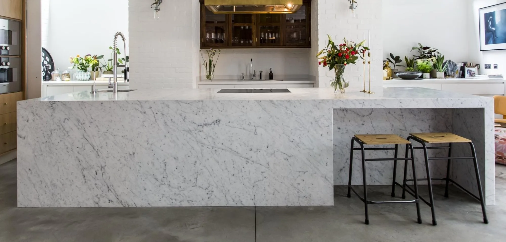 Carrera White Marble Kitchen Countertops and Island with Waterfall Panel Front