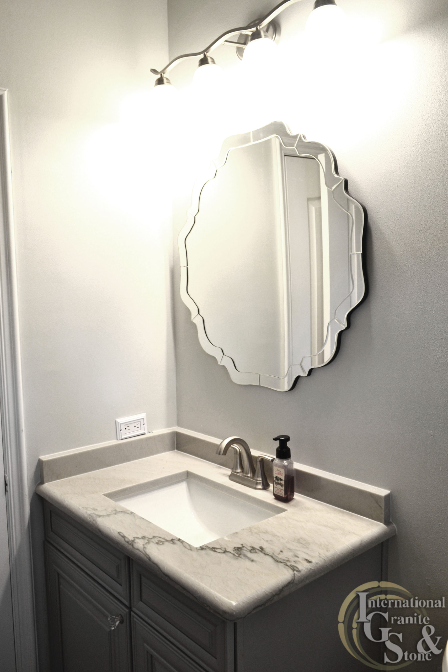 Bathroom Vanity with Quartzite and Single Mirror