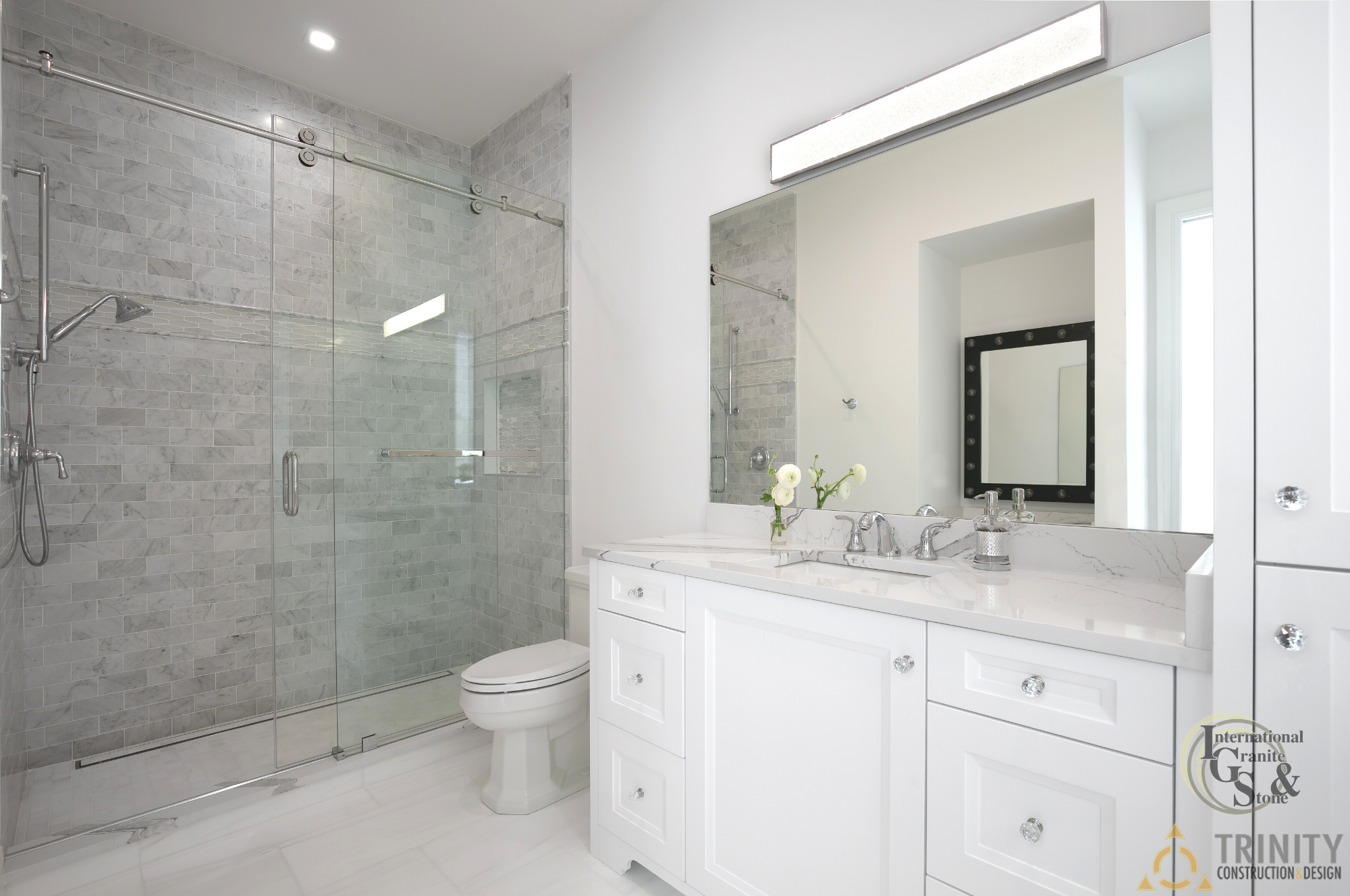 Bathroom Cambria Quartz Brittanicca Countertops and Subway Tile Gray Backsplash