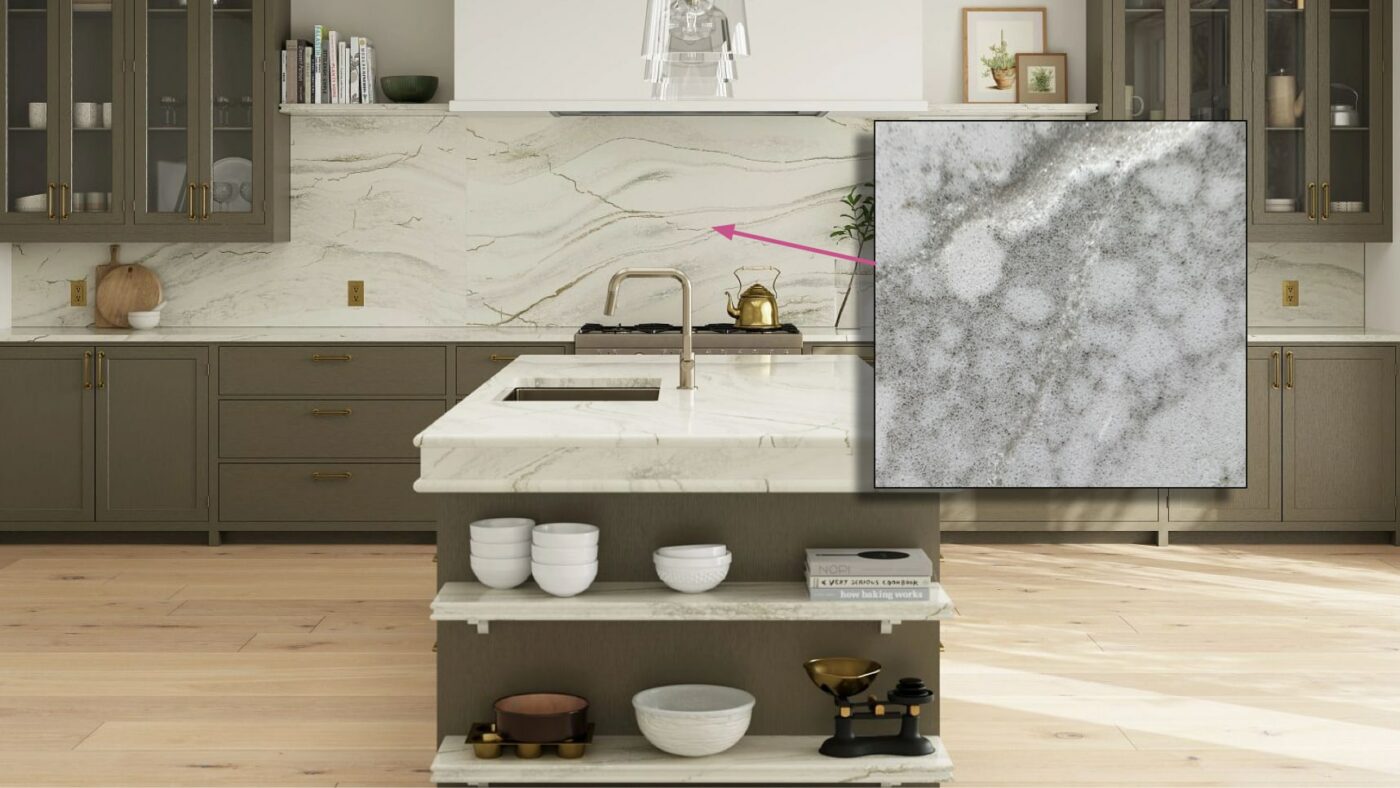 Close-up view of Cambria Inverness Everleigh Quartz kitchen countertops, showcasing its intricate pattern of cool gray and warm, sand-honey tones accented by debossed Inverness veins.