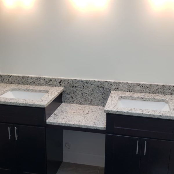 Ornamentale White Granite Bathroom