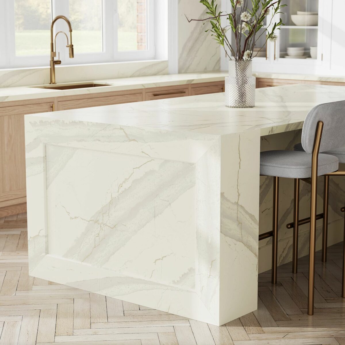 A close-up view of Cambria Inverness Swansea Quartz, showcasing its tonal white, marbled design with intricate debossed Inverness veins. Available in both high gloss and Cambria Matte finishes installed kitchen countertops